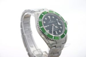 rolex green submariner anniversary display